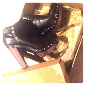 Authentic leather UGG booties with silver accents